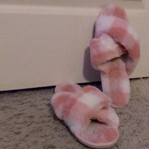 Pink and white slippers